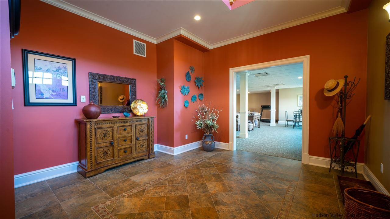 374 Kristins Ridge Road Margaretville, NY 12455 - Photo 29 of 33 a bedroom with a bed and a mirror