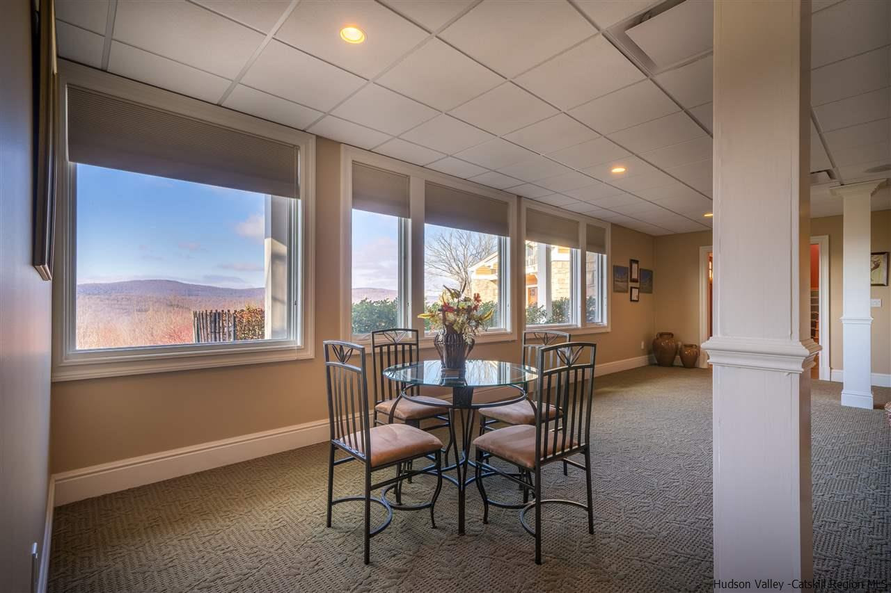 374 Kristins Ridge Road Margaretville, NY 12455 - Photo 30 of 33 a dining room with furniture and window