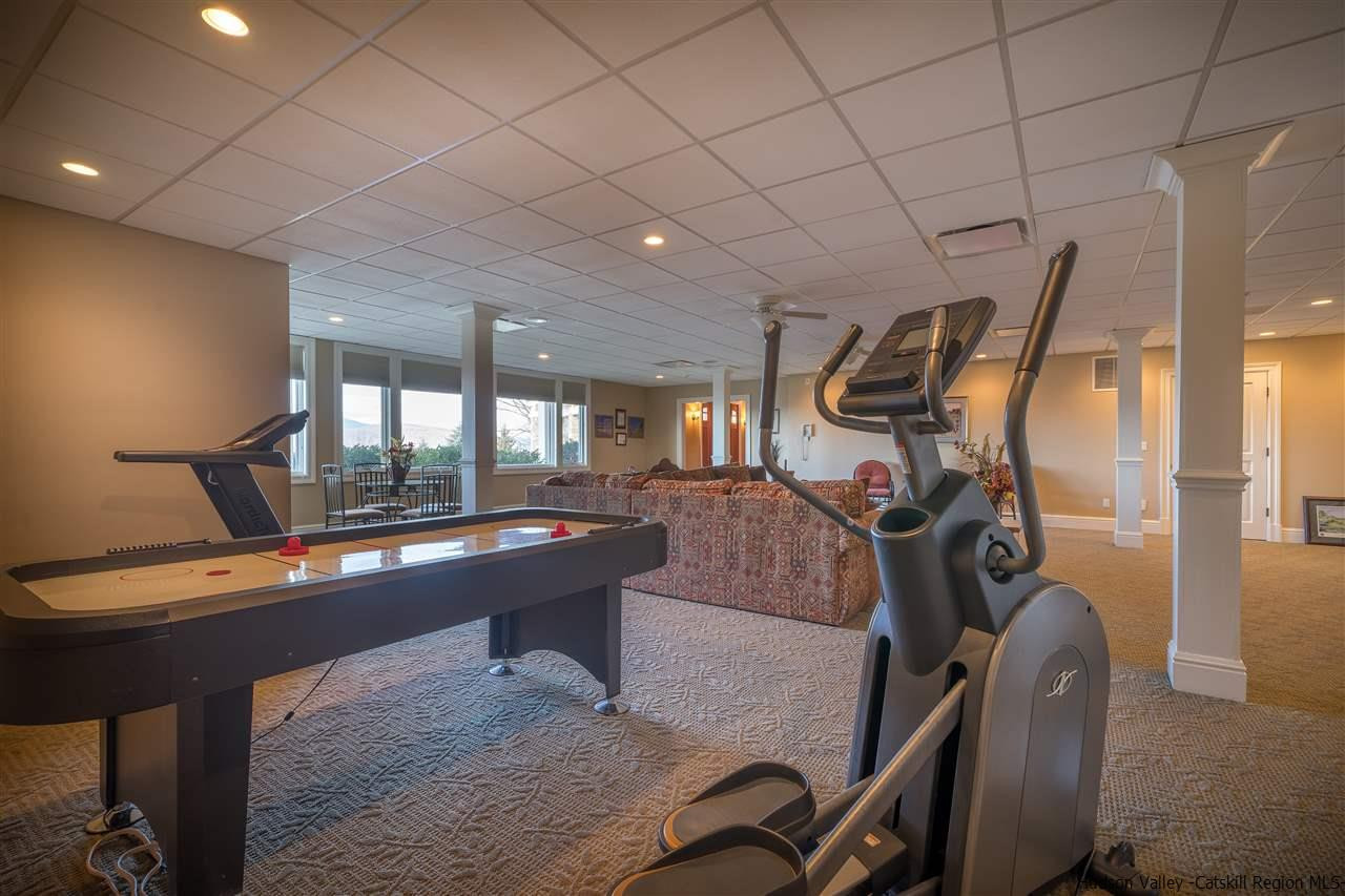 374 Kristins Ridge Road Margaretville, NY 12455 - Photo 32 of 33 a view of a room with gym equipment