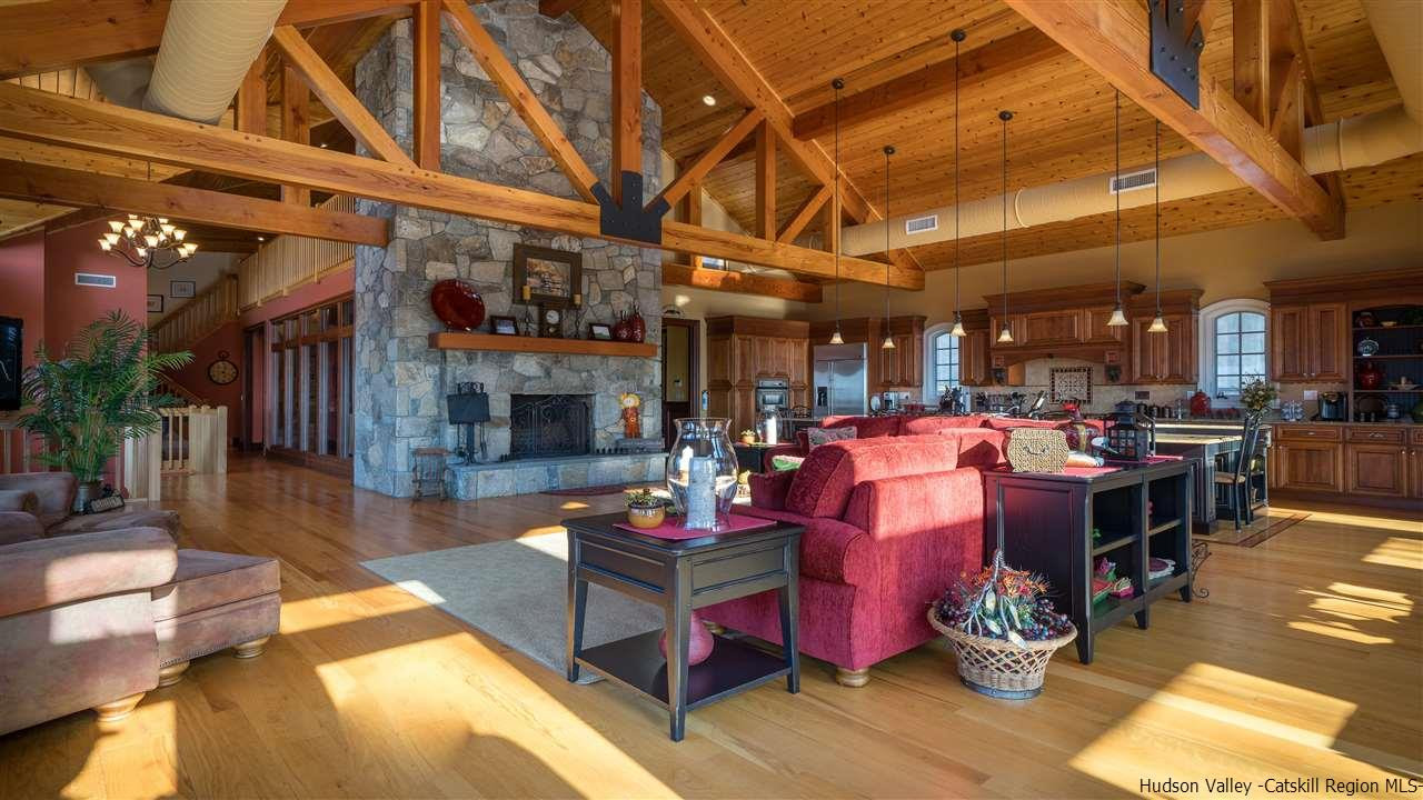 374 Kristins Ridge Road Margaretville, NY 12455 - Photo 6 of 33 a living room with lots of furniture and kitchen view