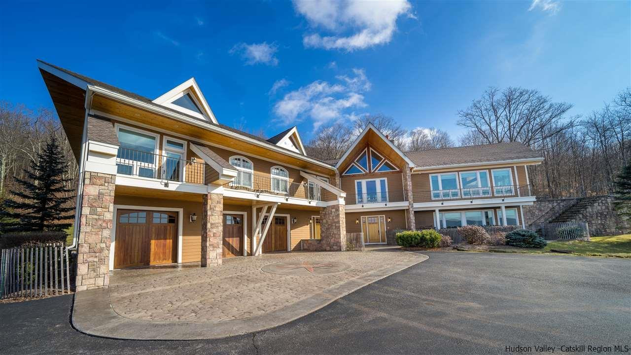 374 Kristins Ridge Road Margaretville, NY 12455 - Photo 8 of 33 a front view of a house with a yard