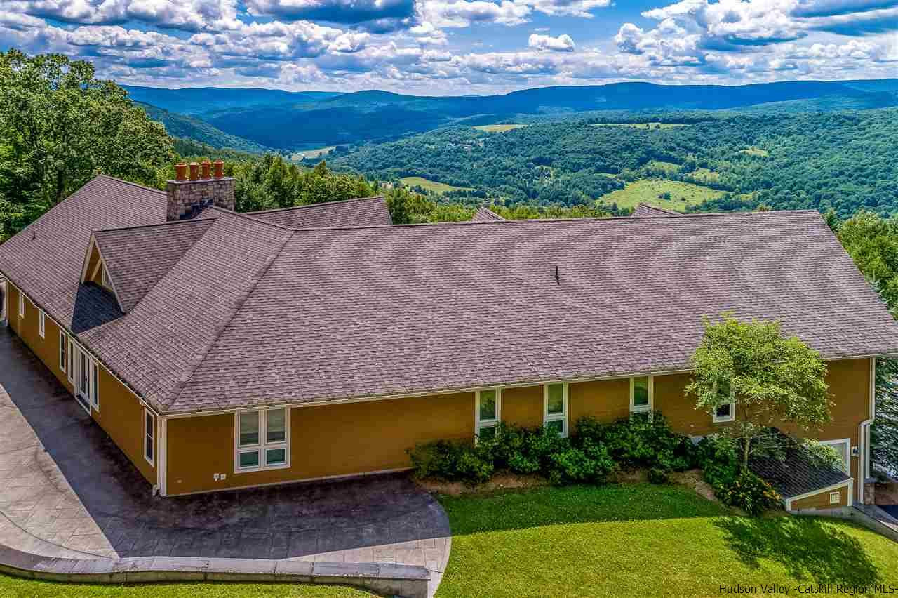 374 Kristins Ridge Road Margaretville, NY 12455 - Photo 9 of 33 a aerial view of a house with a garden and a yard