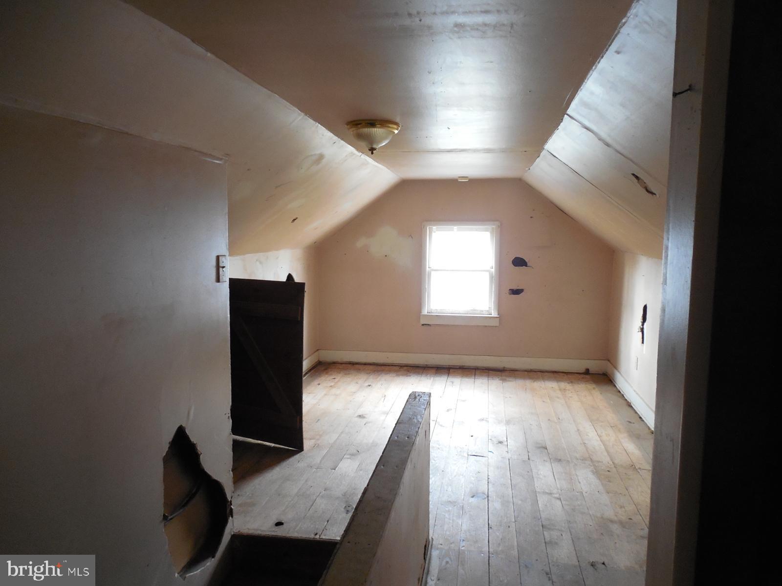 27 Allegretto Road New Castle, DE 19720 - Photo 17 of 23 wooden floor in an empty room with a window