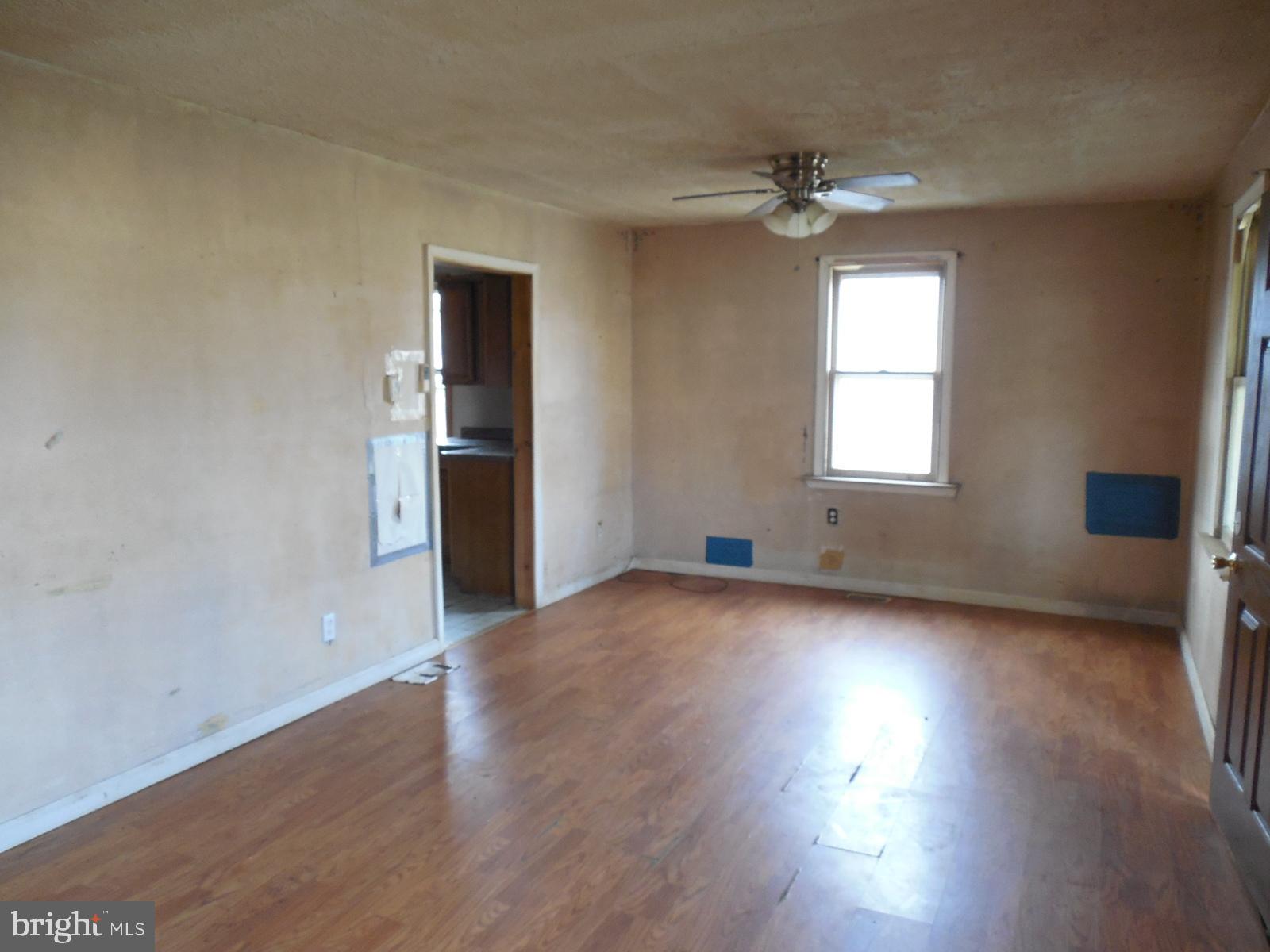 27 Allegretto Road New Castle, DE 19720 - Photo 22 of 23 an empty room with wooden floor and windows