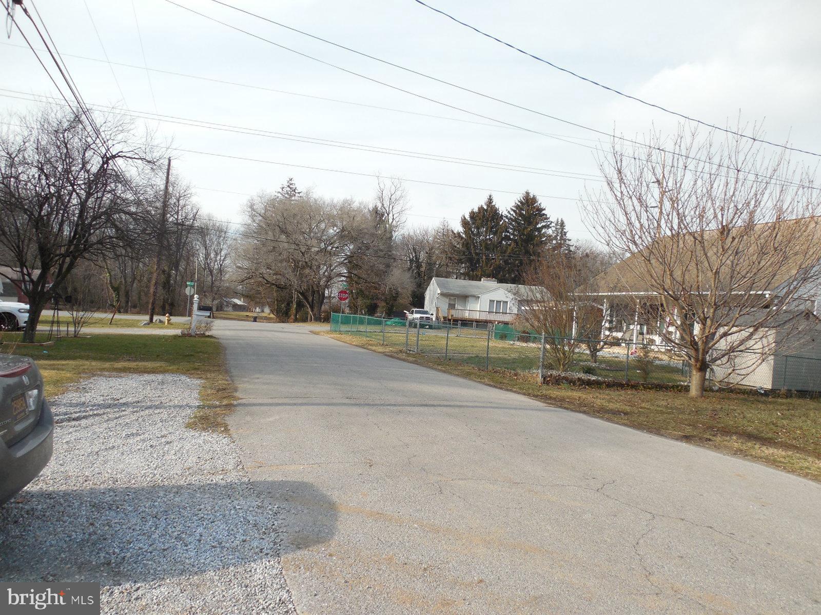 27 Allegretto Road New Castle, DE 19720 - Photo 8 of 23 a view of a street with of houses