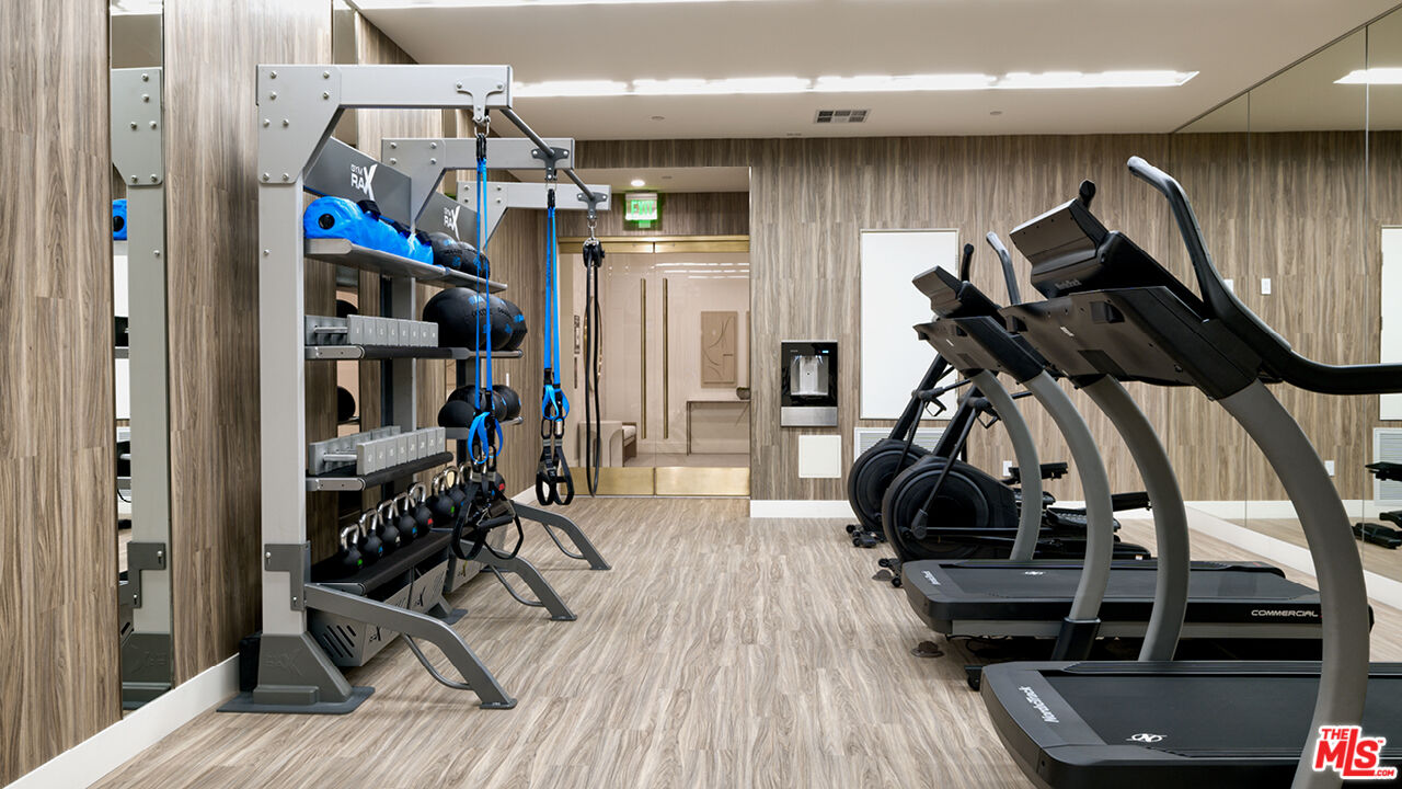 425 North Palm Drive, Unit 401 Beverly Hills, CA 90210 - Photo 12 of 22 a view of a room with gym equipment