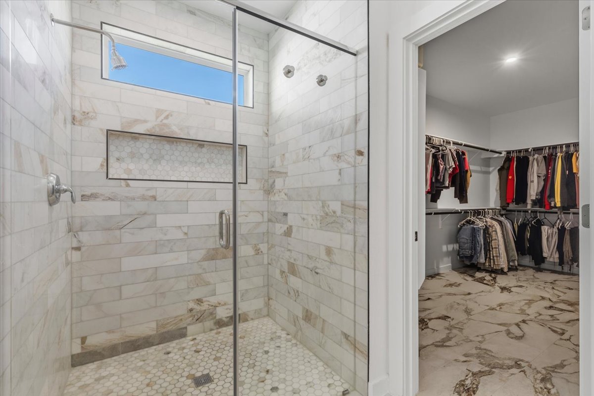 1904 Varese Path Leander, TX 78641 - Photo 18 of 40 a bathroom with a shower