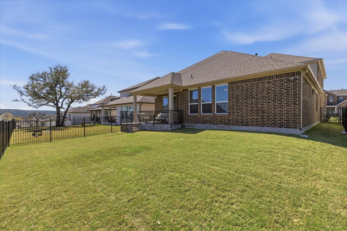 1904 Varese Path Leander, TX 78641 - Photo 32 of 40 a front view of a house with a yard