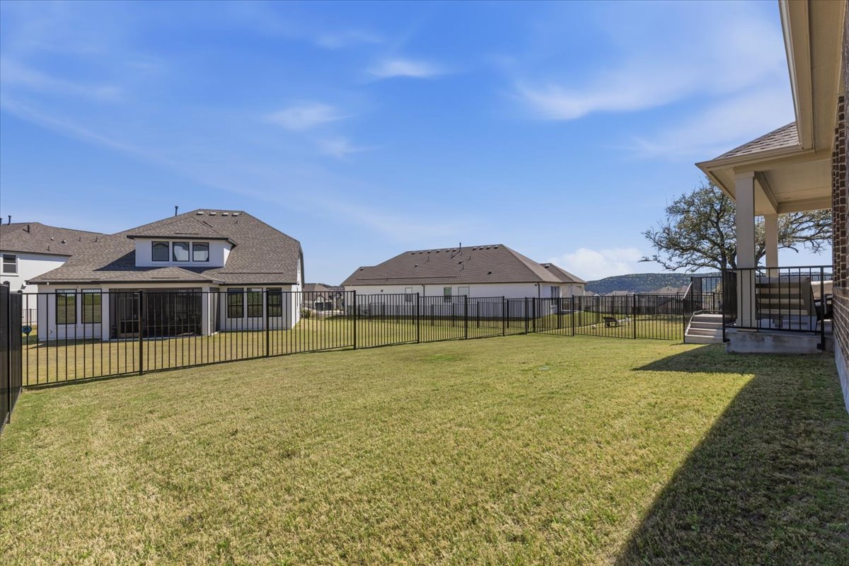 1904 Varese Path Leander, TX 78641 - Photo 37 of 40 a view of a house with swimming pool and a yard