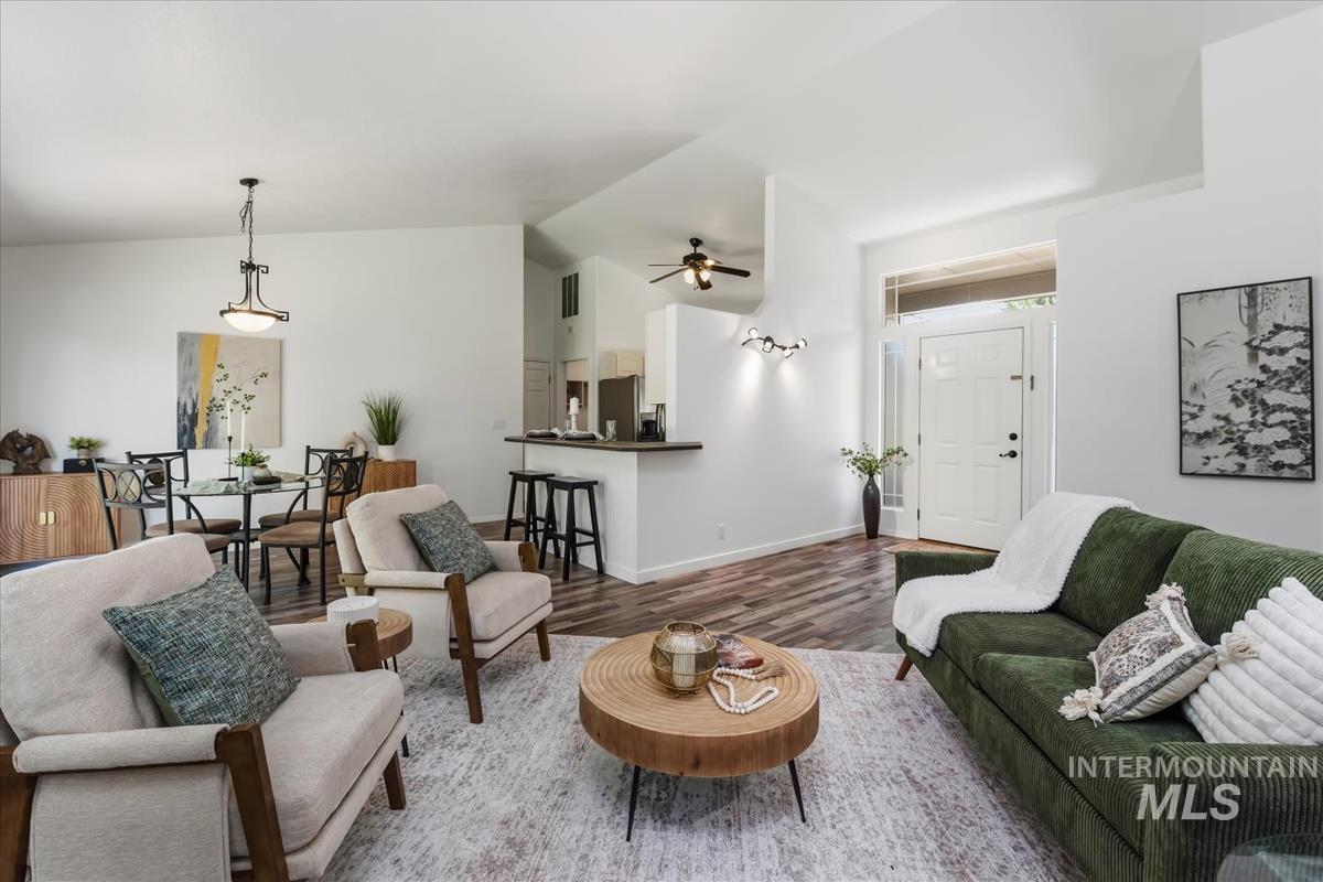 802 North Echohawk Way Eagle, ID 83616 - Photo 21 of 30 Spacious living area featuring wood-finish flooring and vaulted ceilings