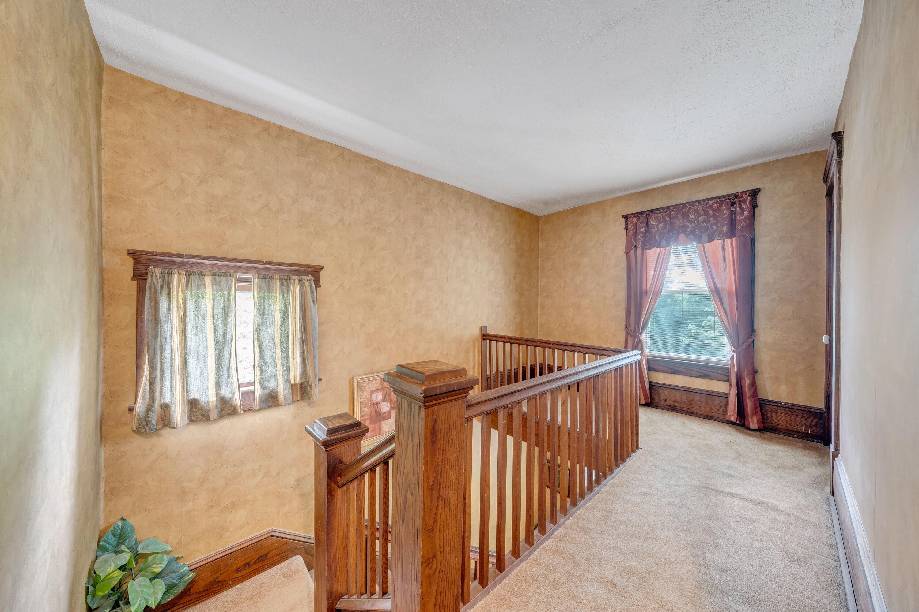 3759 Mill Iron Road Goodview, VA 24095 - Photo 21 of 39 a view of a room with wooden floor and windows