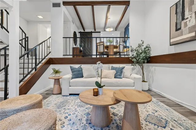 a outdoor living space with furniture and wooden floor