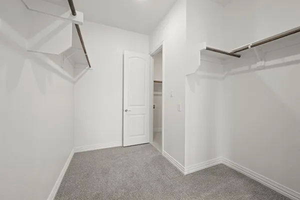 a view of hallway with shower