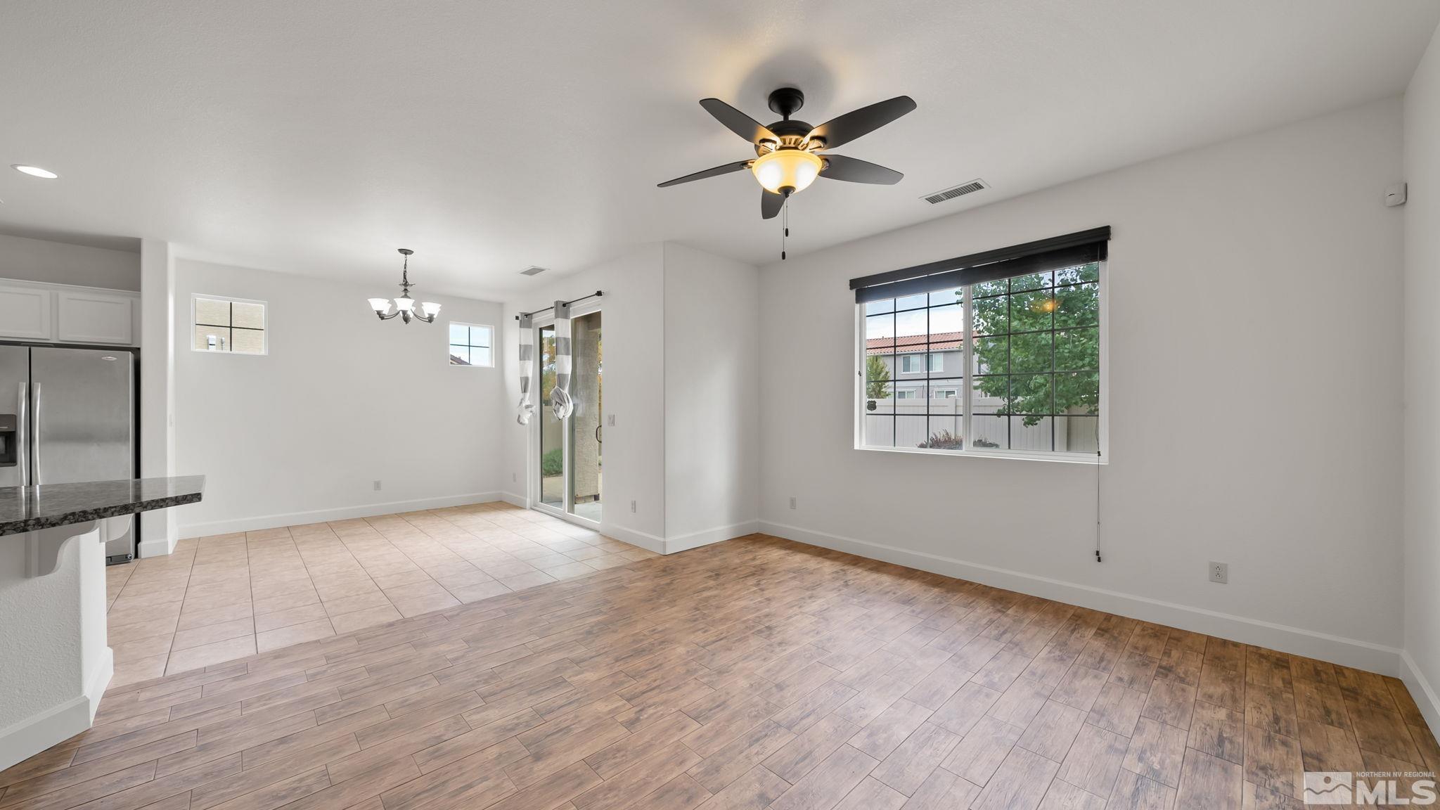 11074 Colton Drive Reno, NV 89521 - Photo 22 of 28 a view of an empty room with a window