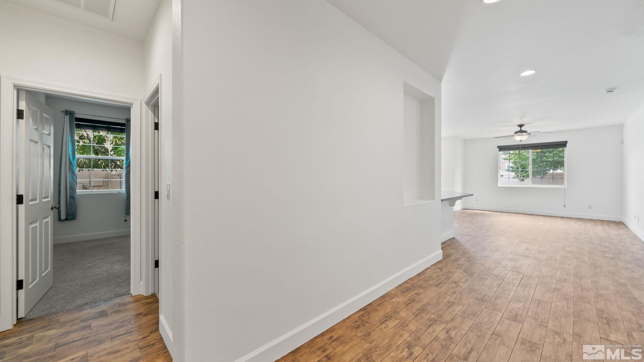 11074 Colton Drive Reno, NV 89521 - Photo 8 of 28 an empty room with windows and closet