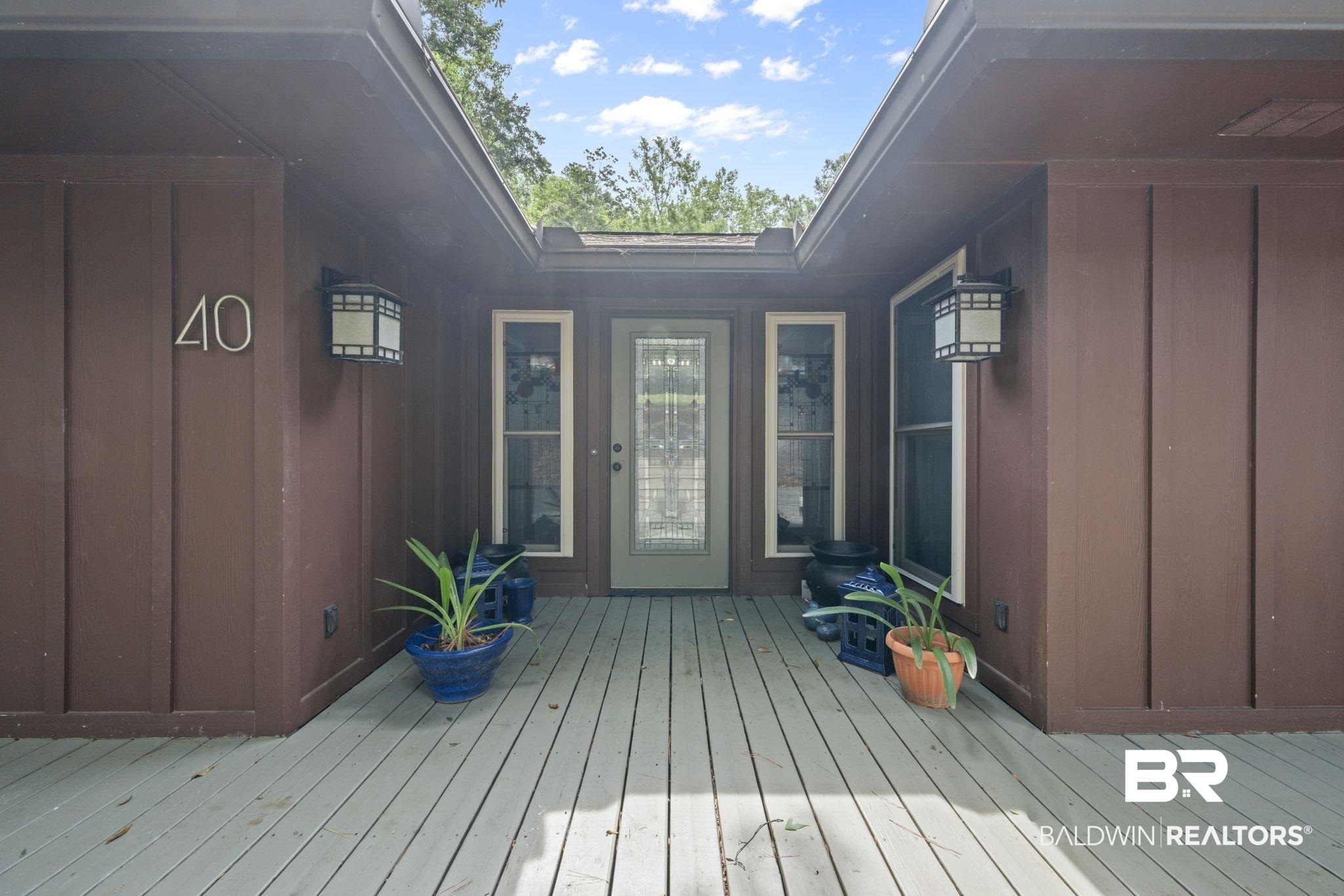 40 Caisson Trace Daphne, AL 36527 - Photo 3 of 54 View of exterior entry with a deck