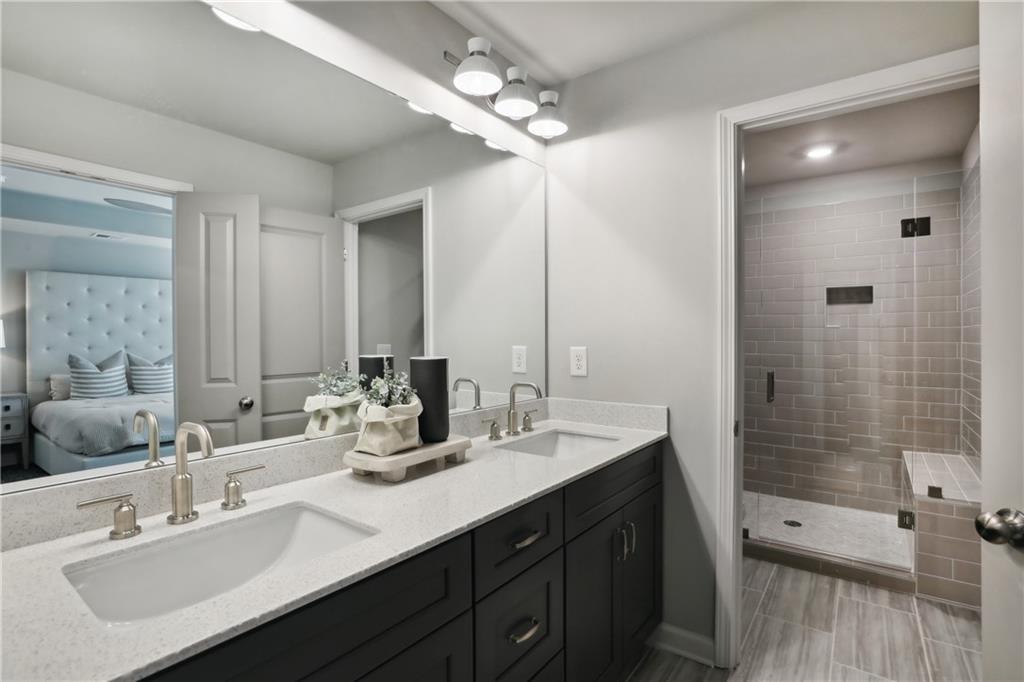 911 East Green Lane Clarkston, GA 30021 - Photo 21 of 43 a bathroom with 2 sink tub and shower