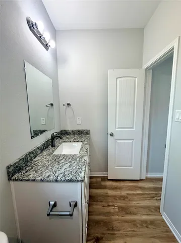 a bathroom with a sink and a toilet