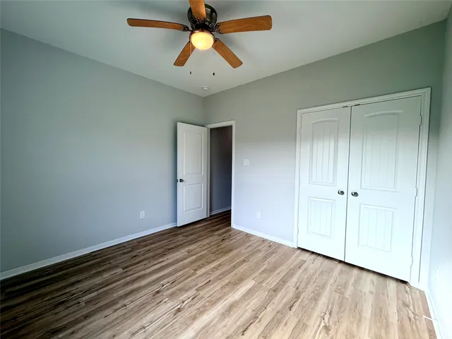 a picture of a bench in front of a door