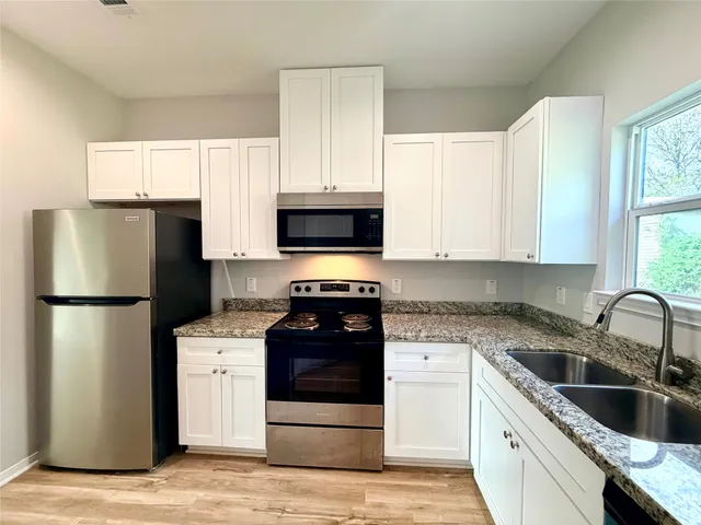 a view of small space with wooden floor