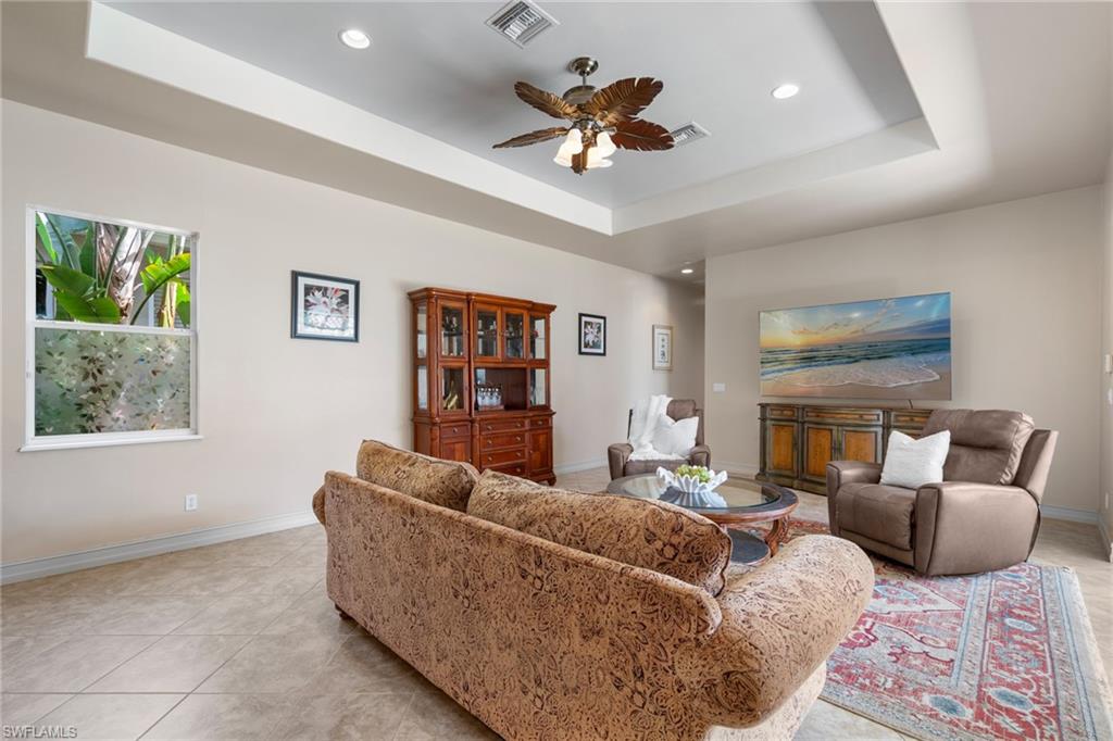 20060 Markward Crossing Estero, FL 33928 - Photo 26 of 50 a living room with furniture and a ceiling fan