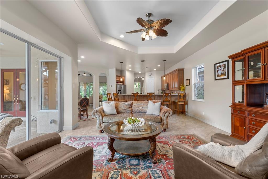 20060 Markward Crossing Estero, FL 33928 - Photo 29 of 50 a living room with furniture and a view of kitchen