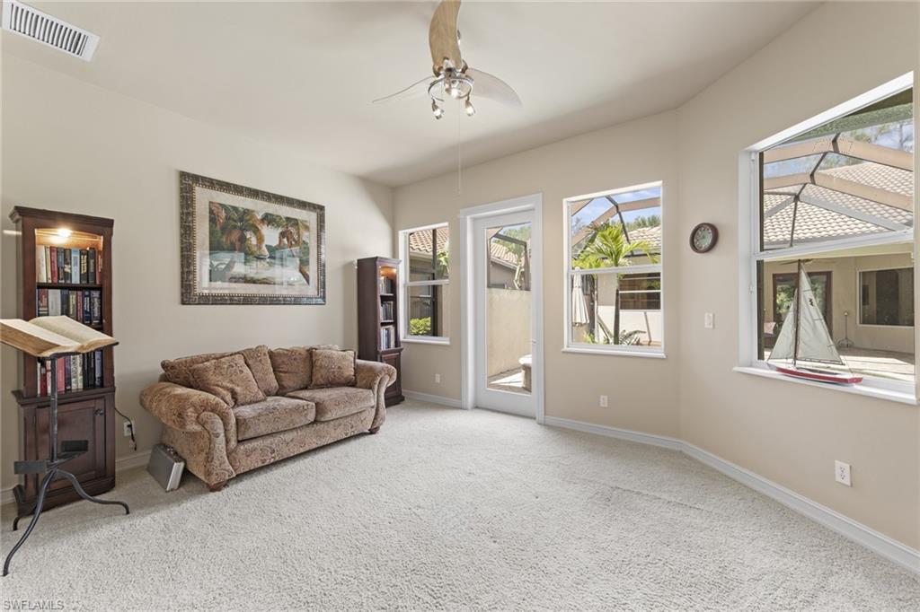 20060 Markward Crossing Estero, FL 33928 - Photo 37 of 50 a living room with furniture and a window