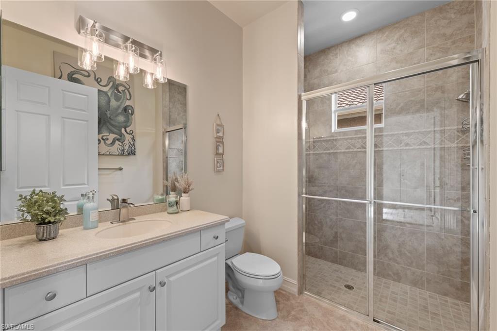 20060 Markward Crossing Estero, FL 33928 - Photo 39 of 50 a bathroom with a sink toilet and shower