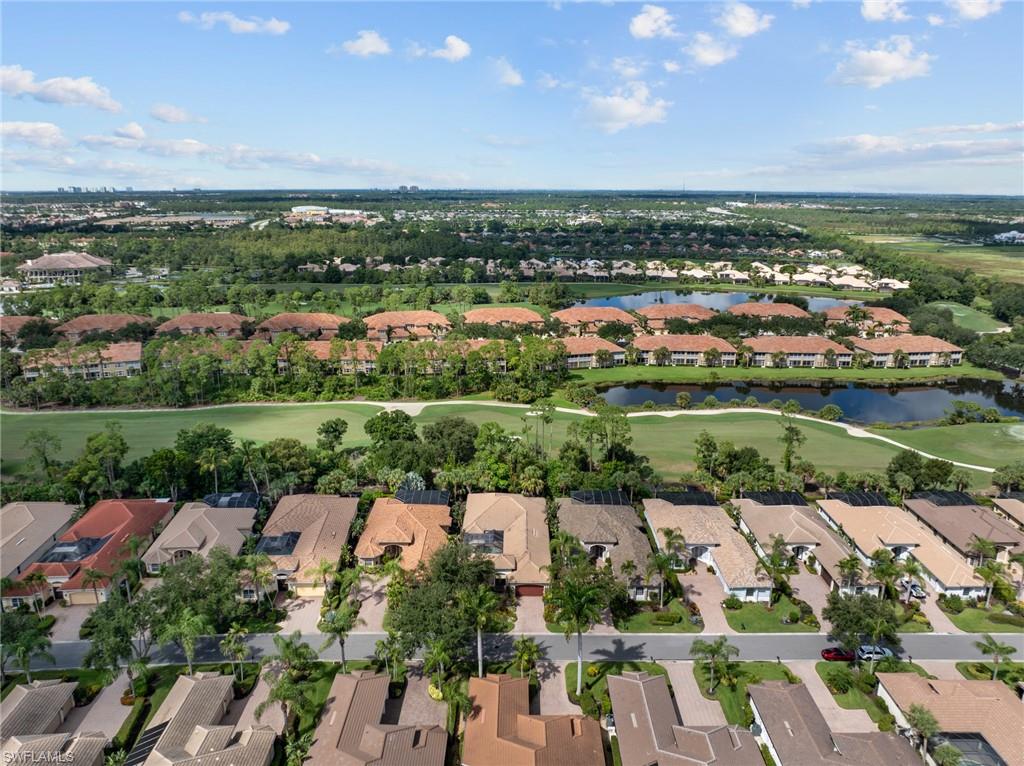 20060 Markward Crossing Estero, FL 33928 - Photo 42 of 50 an aerial view of a city with lake view