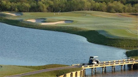 a view of a lake with a yard
