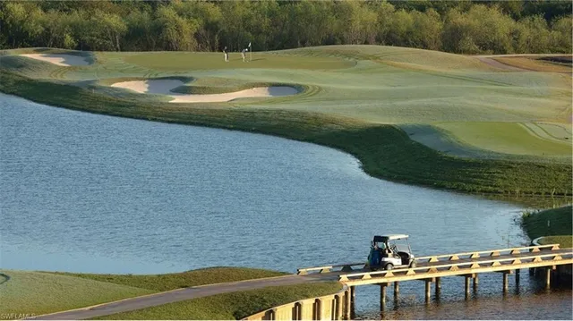 a view of a lake with a yard