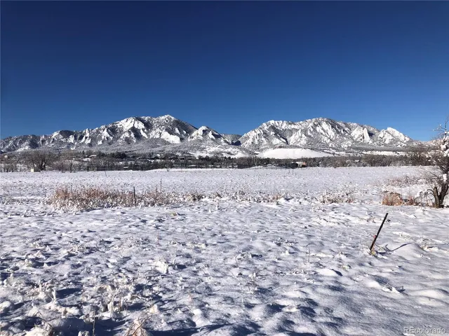 a view of a lake with a mountain