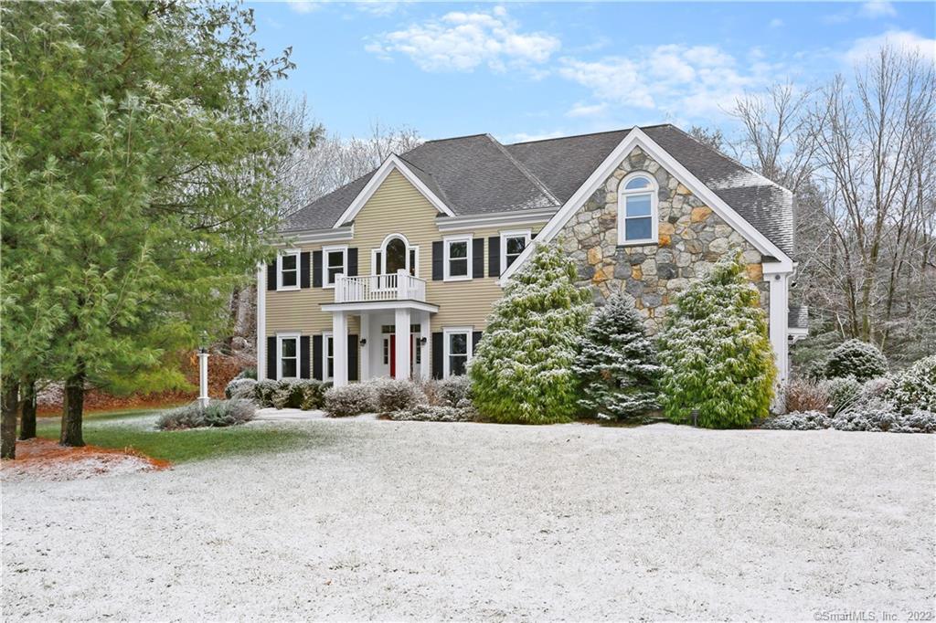 22 Betmarlea Road, Unit B Norwalk, CT 06850 - Photo 1 of 1 a front view of a house with a yard