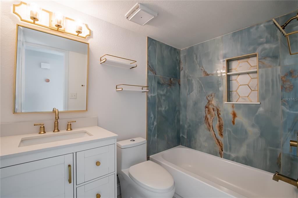 616 Highview Circle North Brandon, FL 33510 - Photo 13 of 41 a bathroom with a sink a toilet and shower