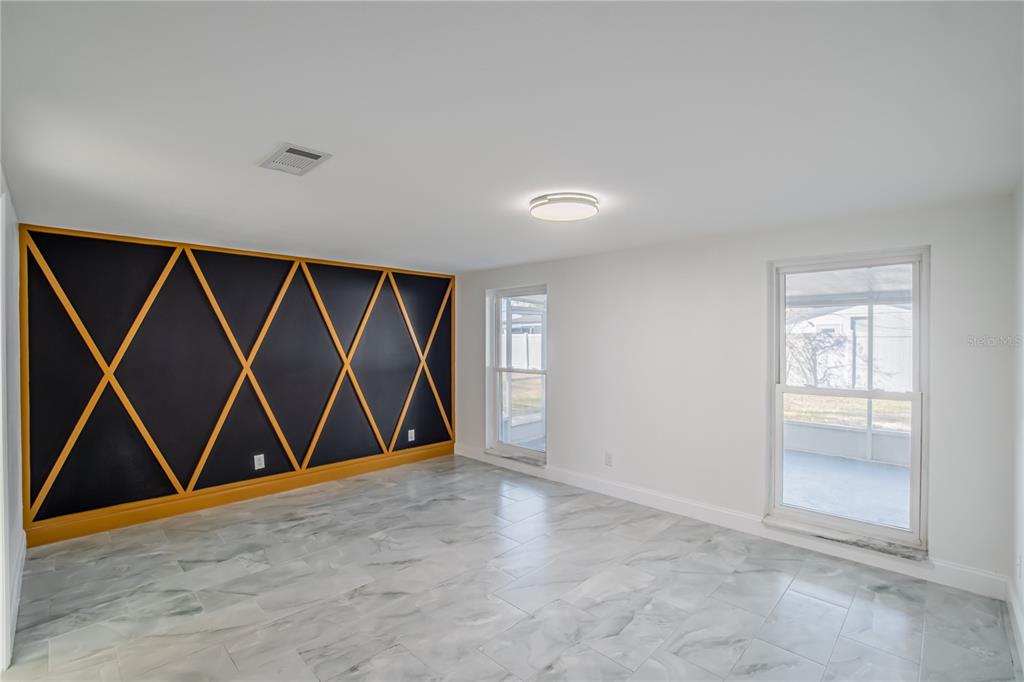 616 Highview Circle North Brandon, FL 33510 - Photo 16 of 41 an empty room with windows