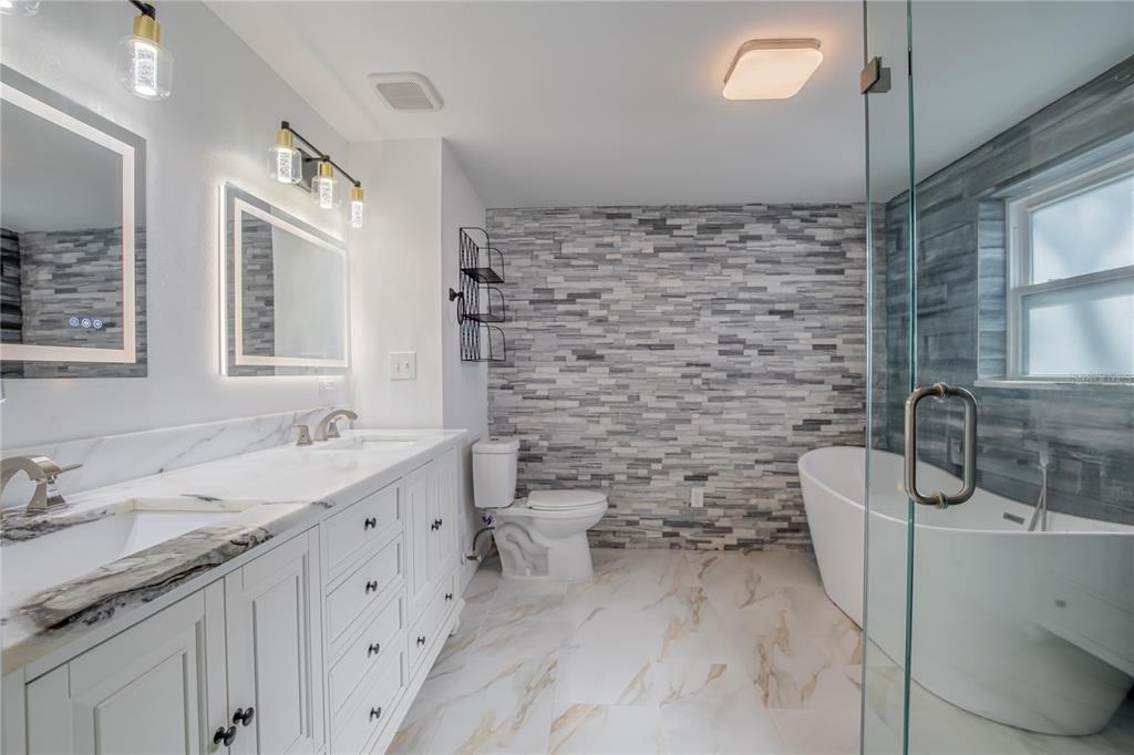 616 Highview Circle North Brandon, FL 33510 - Photo 19 of 41 a bathroom with a sink toilet and shower