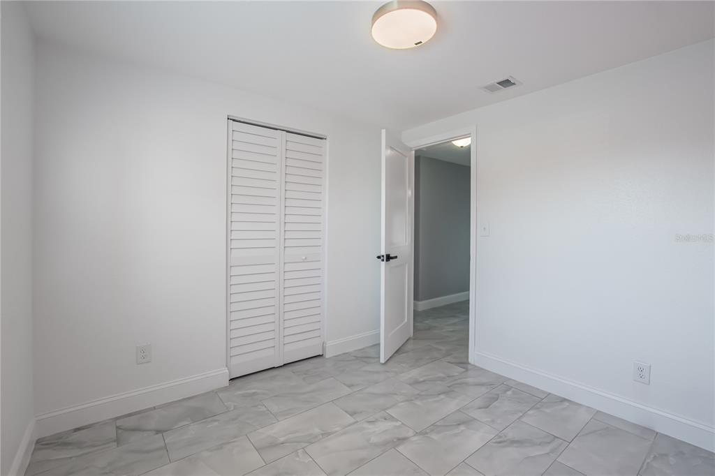 616 Highview Circle North Brandon, FL 33510 - Photo 25 of 41 an empty room with closet