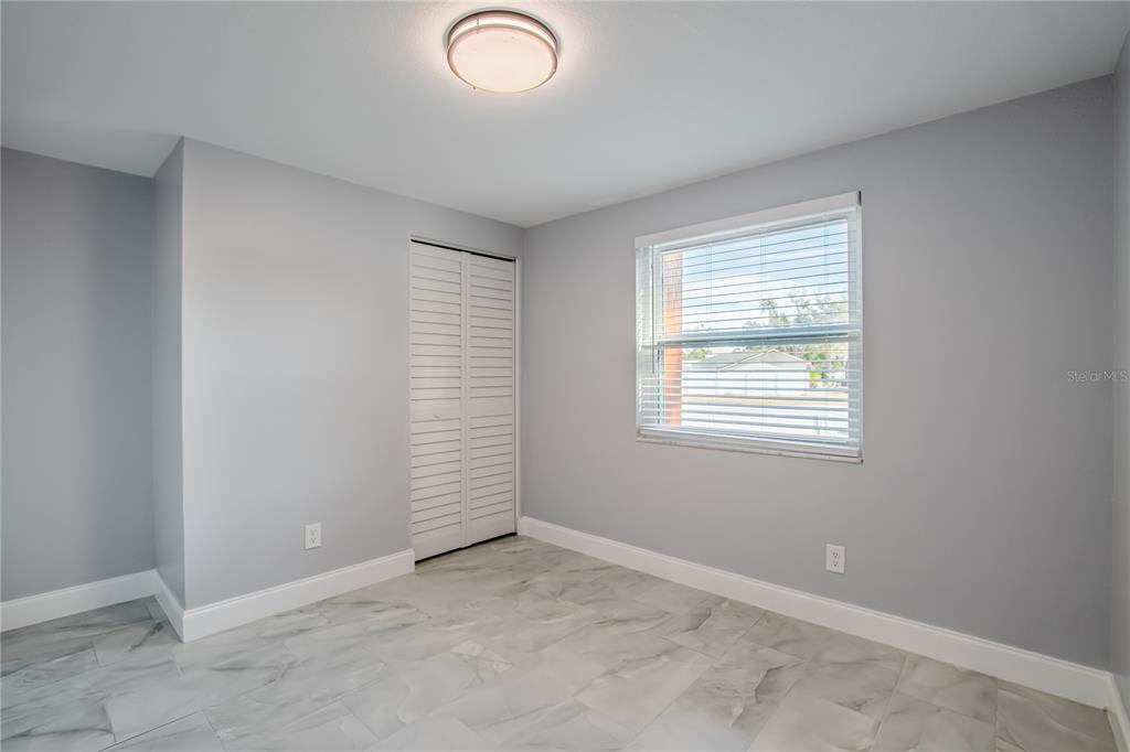 616 Highview Circle North Brandon, FL 33510 - Photo 29 of 41 an empty room with windows