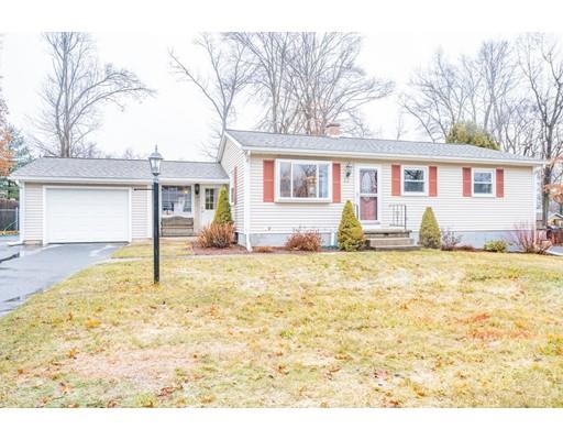 a front view of a house with yard