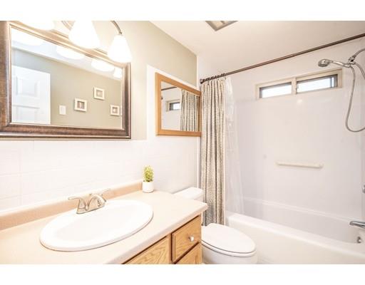 44 Corey Road Springfield, MA 01128 - Photo 13 of 29 a bathroom with a sink and a mirror