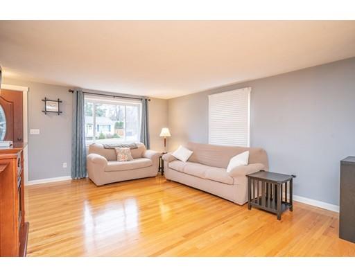 44 Corey Road Springfield, MA 01128 - Photo 5 of 29 a living room with furniture and a couch
