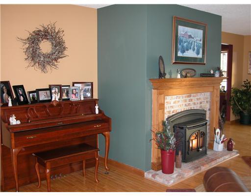 86 Spragueville Road Presque Isle, ME 04769 - Photo 8 of 14 Living Room. Living room with pellet...