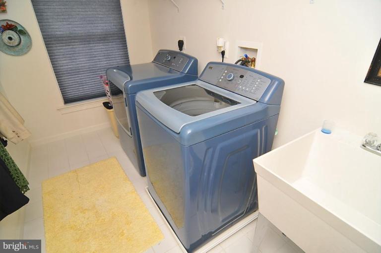 10019 German Road Ellicott City, MD 21042 - Photo 22 of 30 a utility room with dryer and washer
