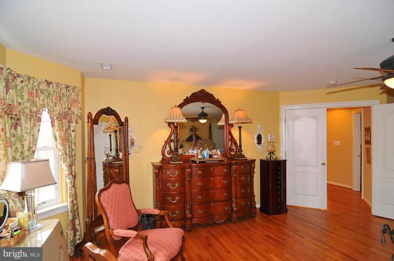 10019 German Road Ellicott City, MD 21042 - Photo 25 of 30 a view of a living room with wooden floor