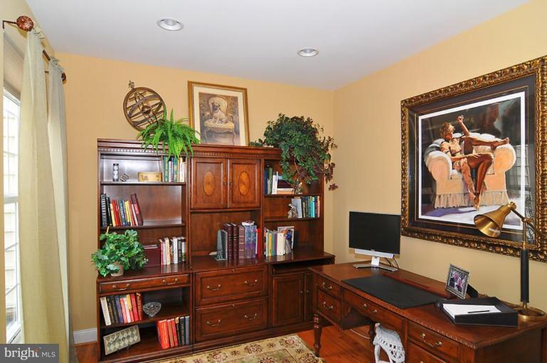 10019 German Road Ellicott City, MD 21042 - Photo 4 of 30 a view of a workspace with a bookshelf