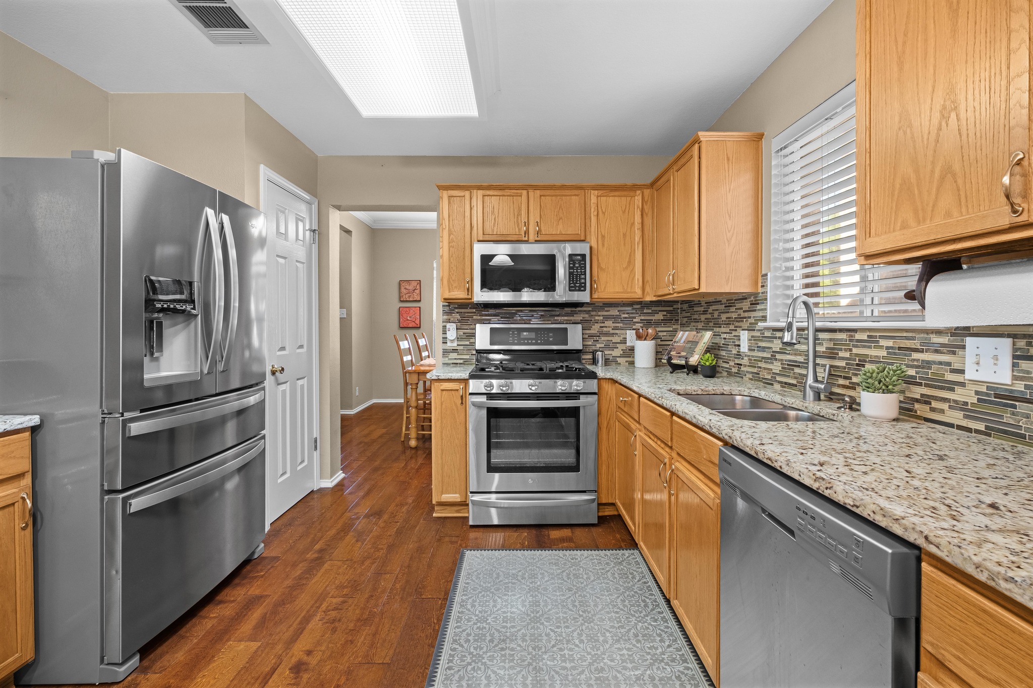 Stainless Steel Appliances- Gas Range & Built in Microwave