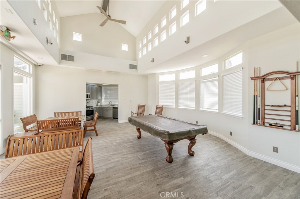 4947 Plumtree Court Riverside, CA 92504 - Photo 43 of 46 HOA Clubhouse offers pool table, cooking area and relaxation space