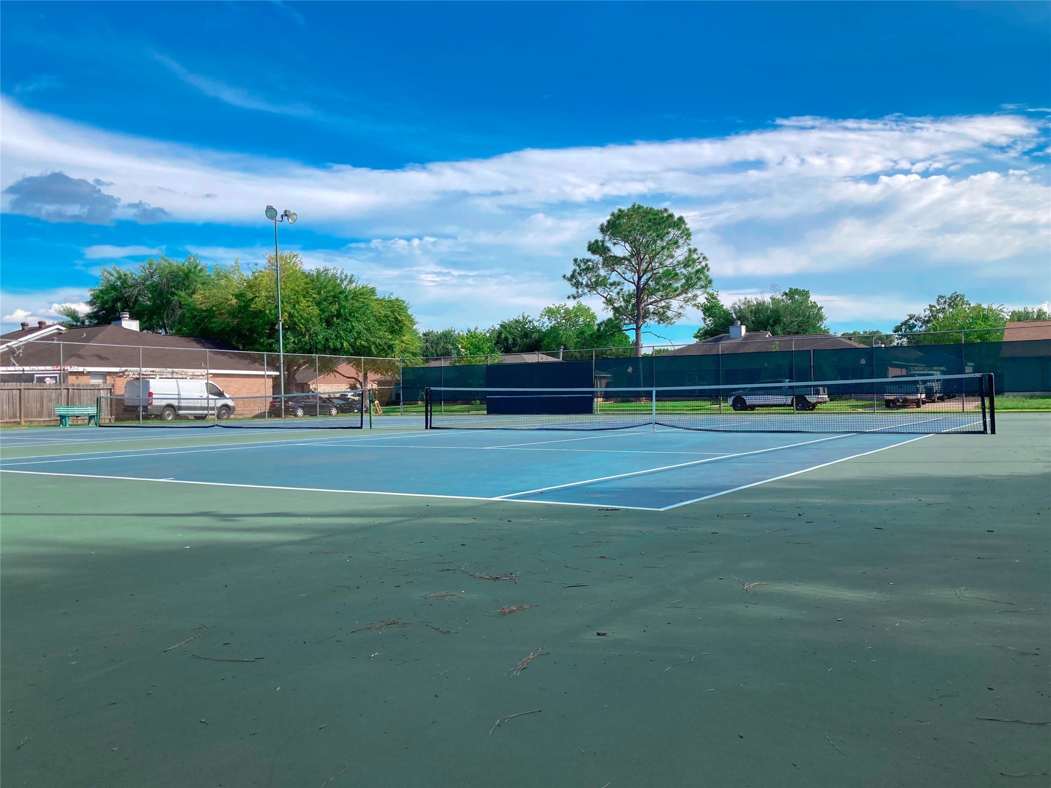 19518 Munsey Court Katy, TX 77449 - Photo 45 of 45 a view of a tennis ground with large trees