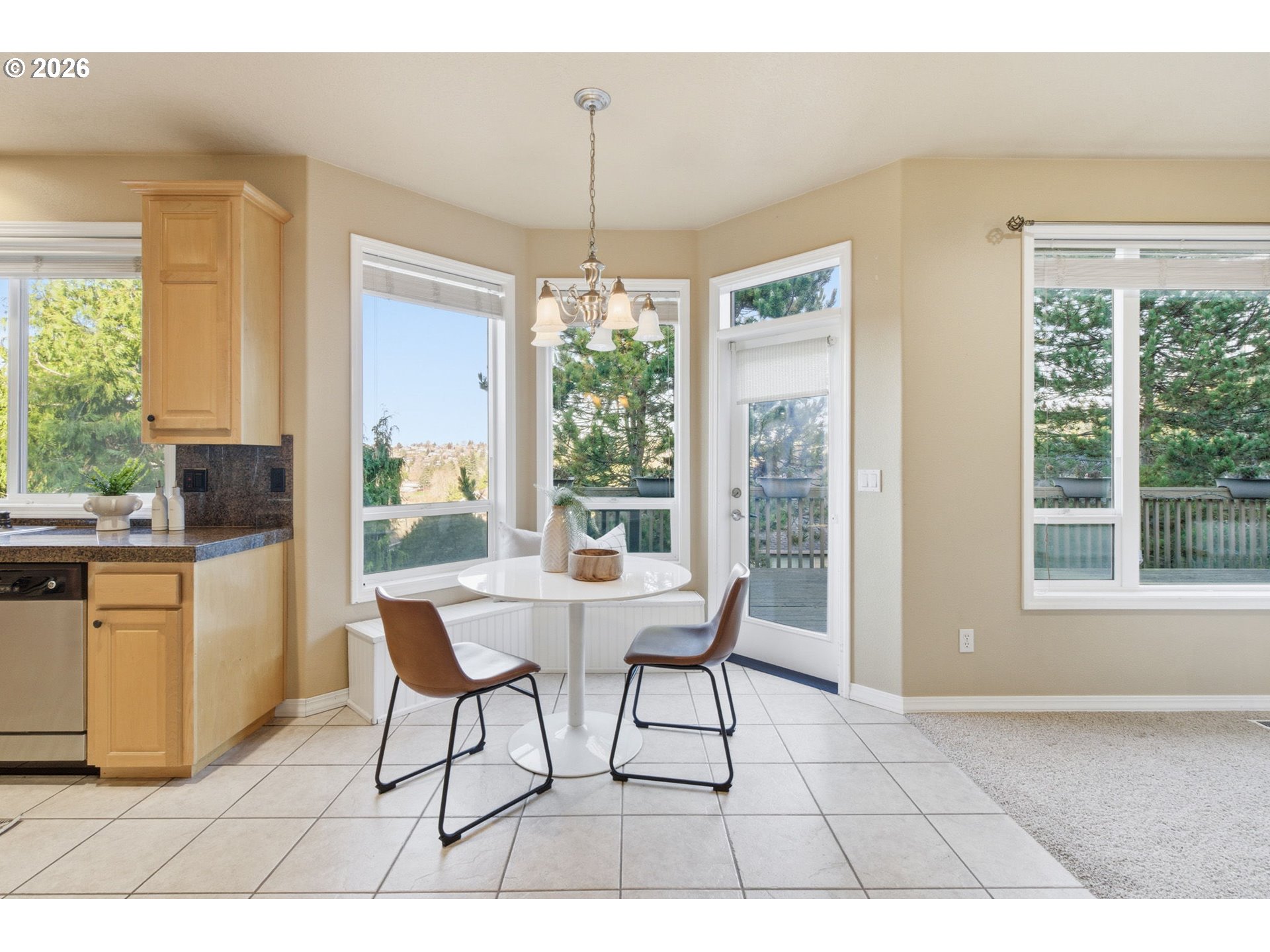 11086 Southeast Rimrock Drive Happy Valley, OR 97086 - Photo 11 of 39 a view of a dining room with furniture window and outside view