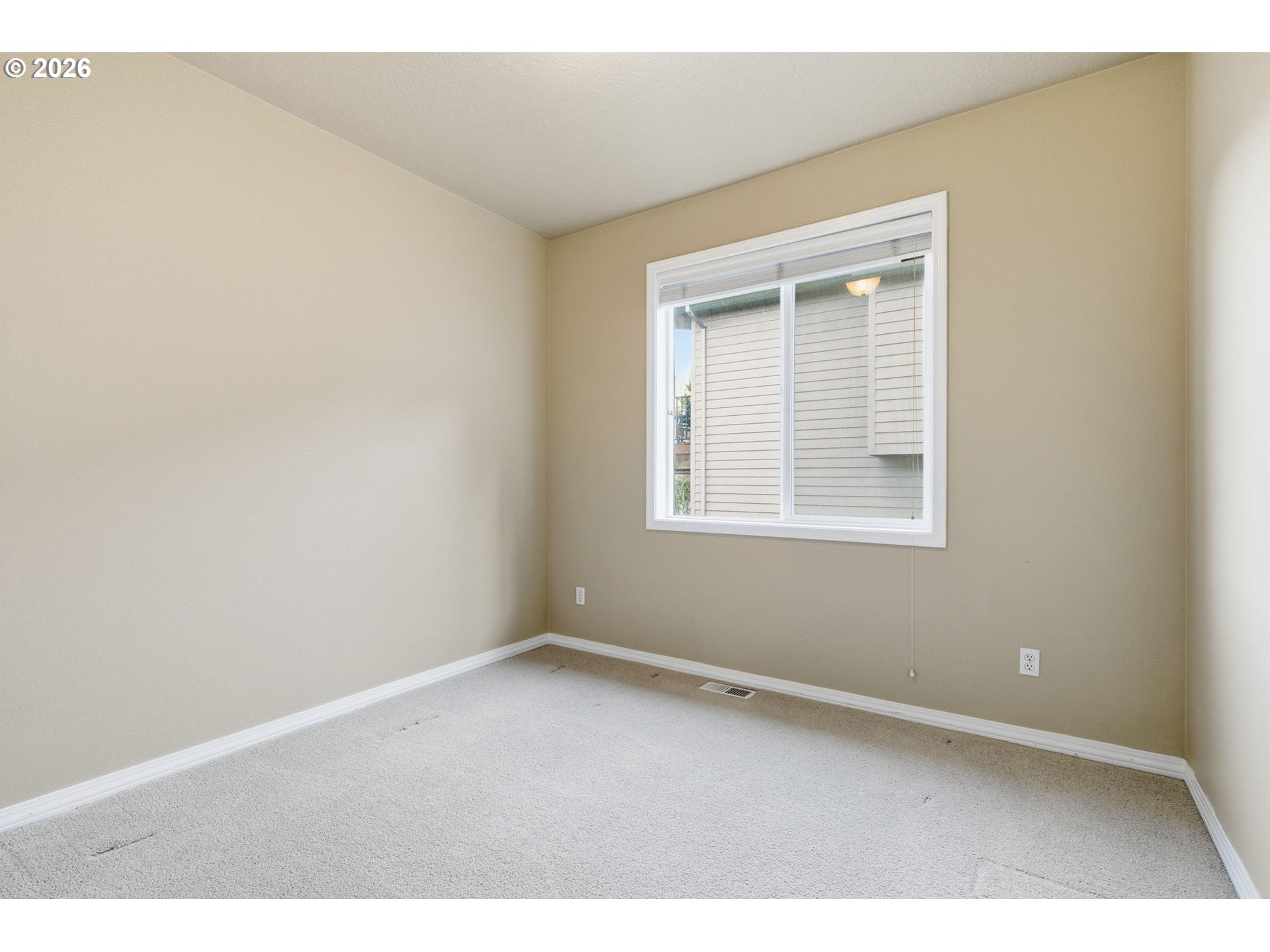 11086 Southeast Rimrock Drive Happy Valley, OR 97086 - Photo 28 of 39 an empty room with a window